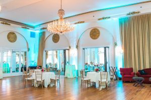 Interior Crystal ballroom; teal, orange and pink decor; florals