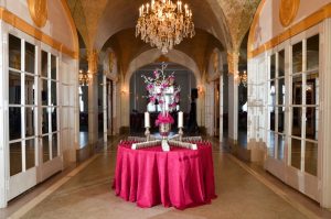 Pink placecard table in hall of mirrors