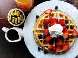 belgian waffle with fruit and whipped cream