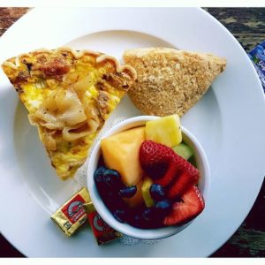 quiche lorraine with fruit and scone