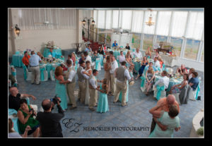 wedding party dancing in garden room