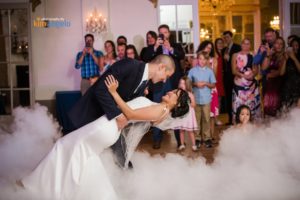 bride and groom first dance in crystal ballroom