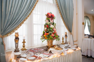 antipasto station with floral centerpiece